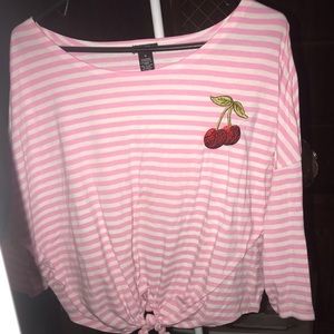 pink and white long sleeve shirt